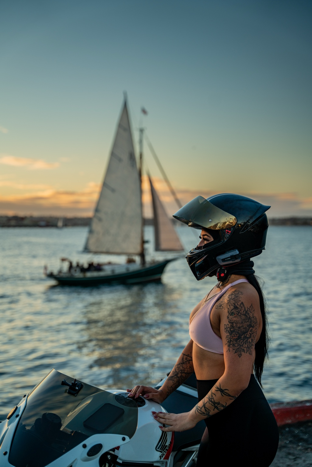 Dalilla with a motorcycle beside the waterfront for Khaotic Lens Photography